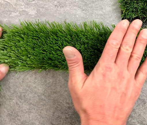 Fan the turf seam to stand the fibers up