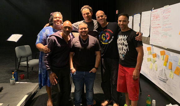 Six members of the show's cast gather for a photograph.
