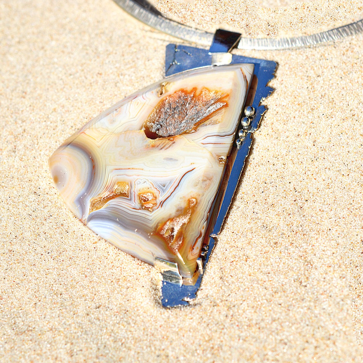 Dije brillos y agata