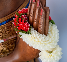 Thai Statue and flowers