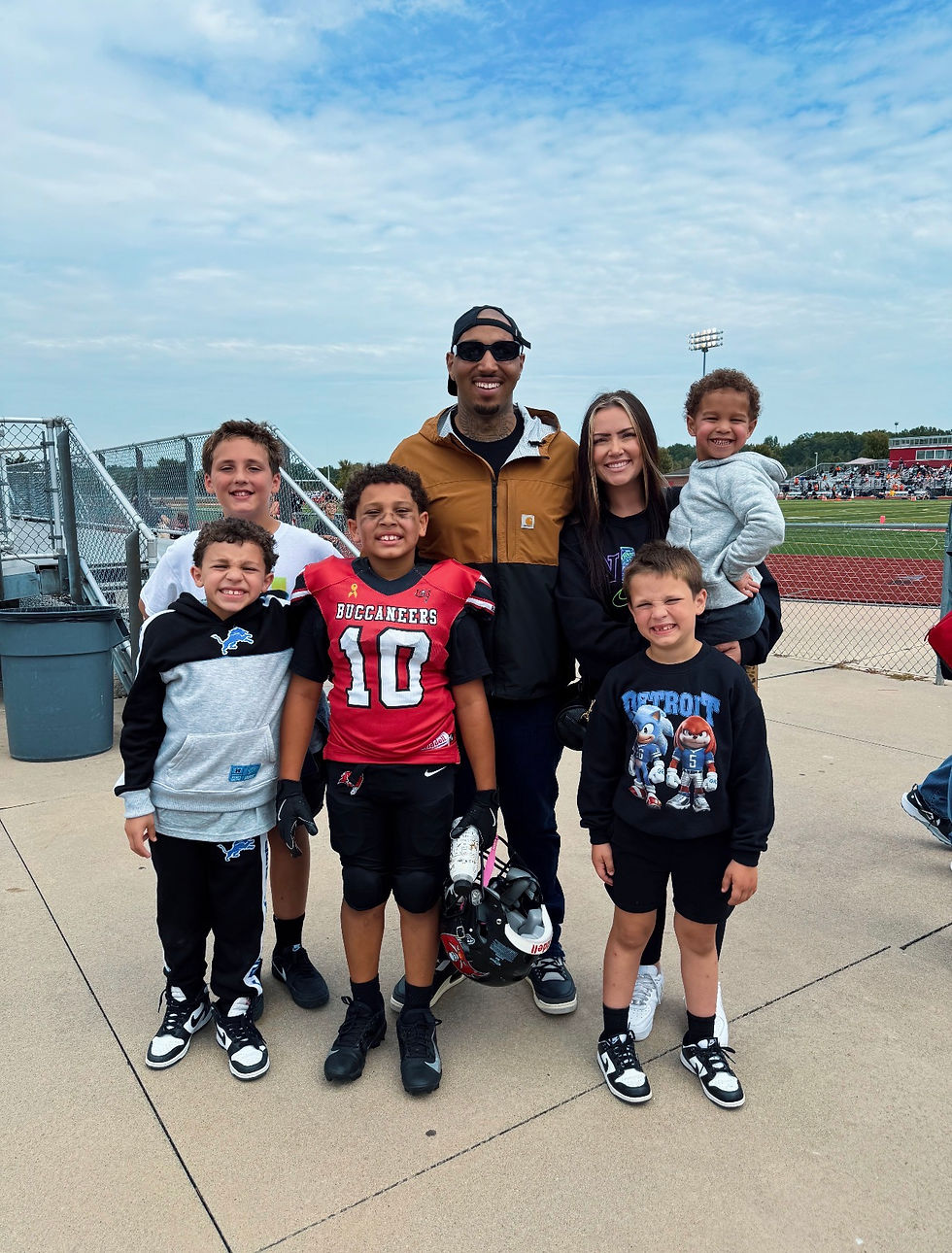 The Johnson's at their son's football game