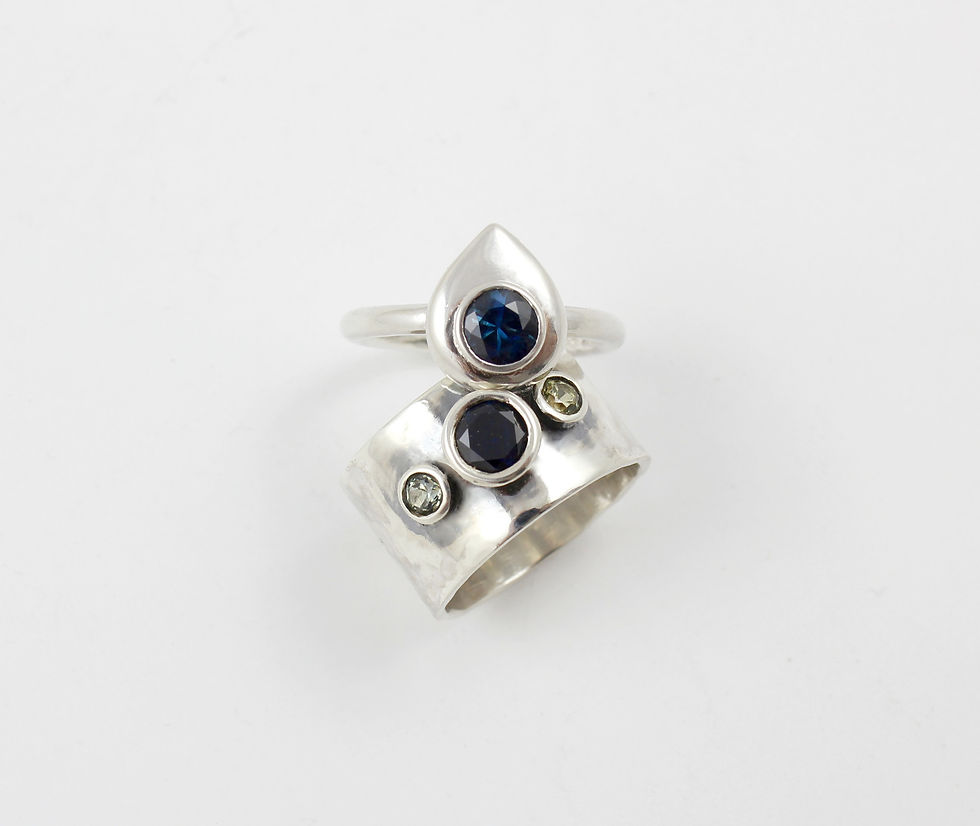 Silver rings using up-cycled stones