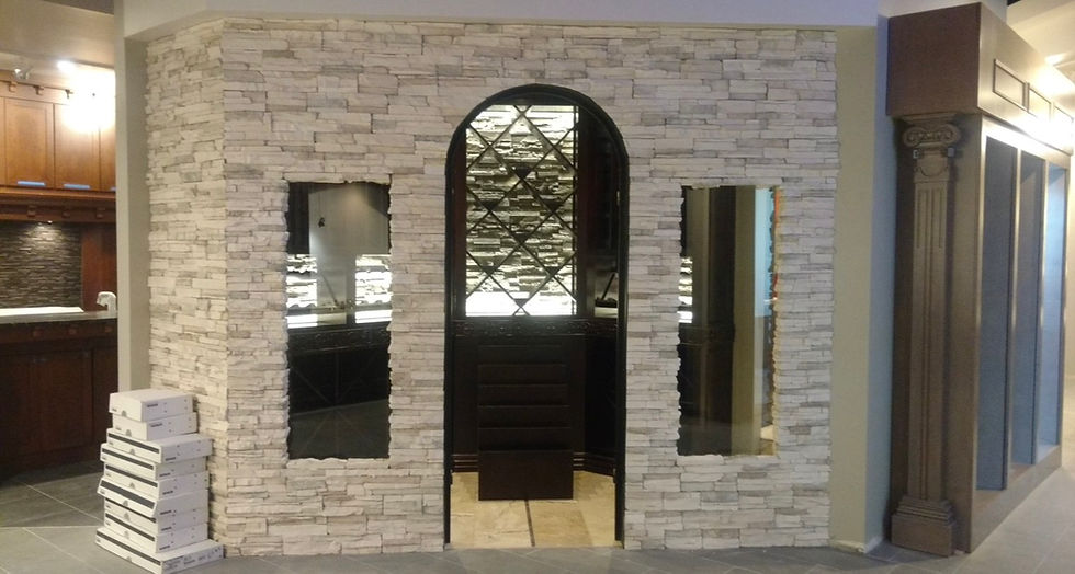 Residential tile installation on stone wine cellar wall