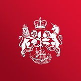 The crest for the Department of Business and Trade, comprising a crown, lion, unicorn and trading ship for the age of sail.