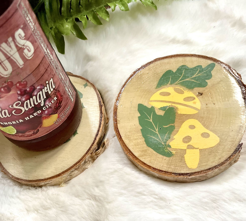 Thumbnail: mushroom desiged wooden coasters on birch slices