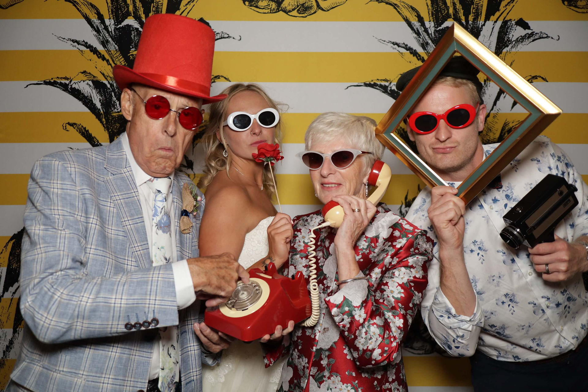 Beautiful shot of Bride Groom and Parents enjoying Flicksbox wedding experience