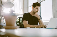 man checking his interview scorecard