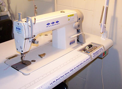 Industrial straight stitch sewing machine