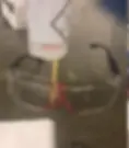 Bloody lab goggles sit on a desk
