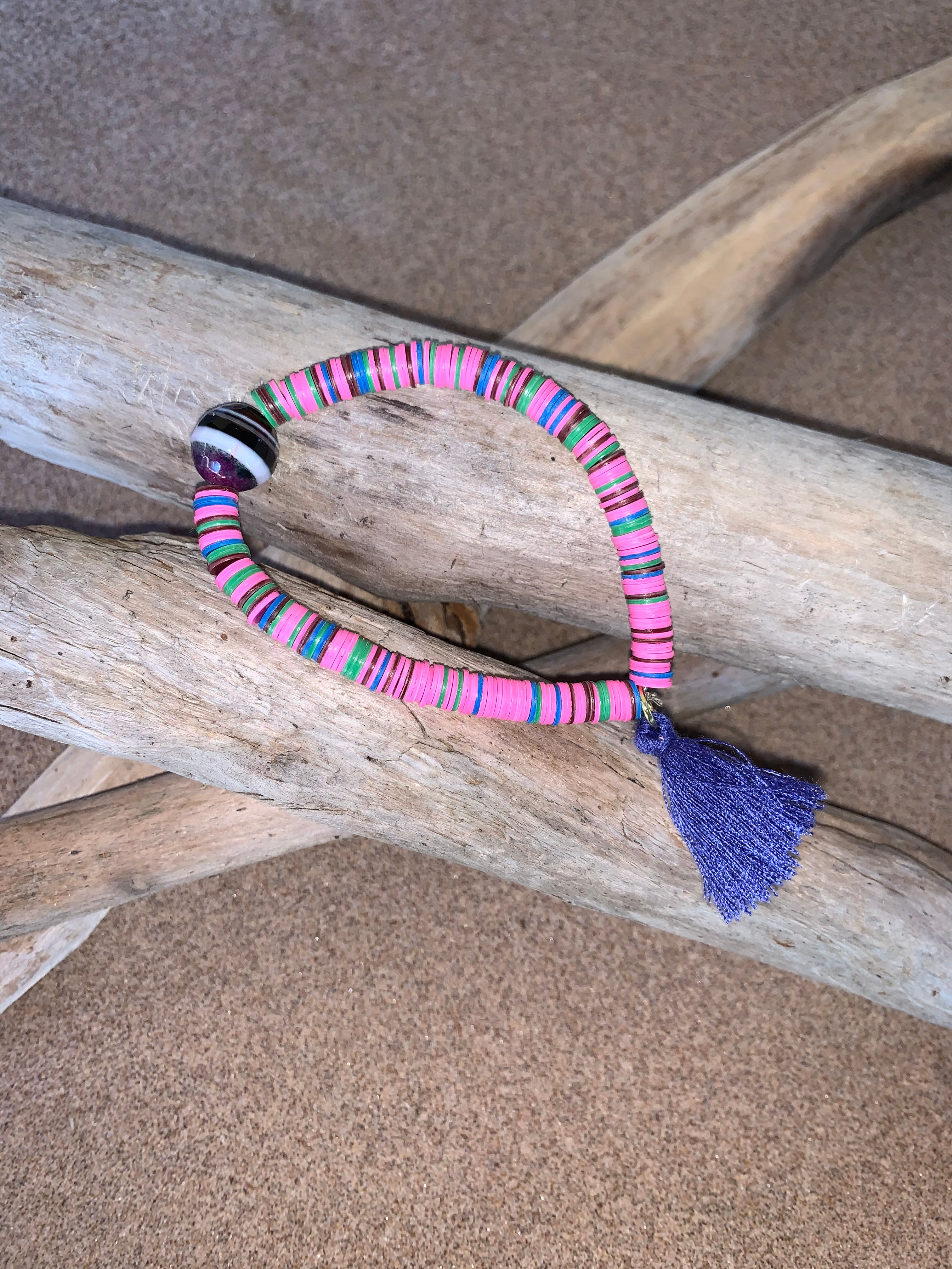 vinyl bracelet with gemstone and tassel