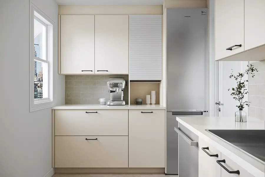 Small NYC kitchen renovation featuring 24-inch appliances, LeMans corner storage, appliance garage, and a total kitchen package cost of approximately $41K–$46K.