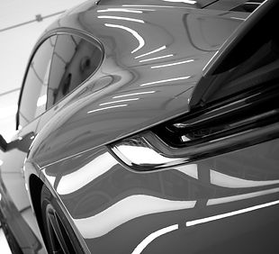 Close up photo of open rear trunk spoiler, black privacy windows and chrome ornaments._edi