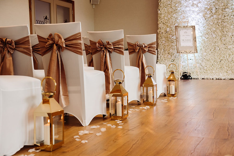 wedding-aisle-gold-lanterns -and petals.jpg