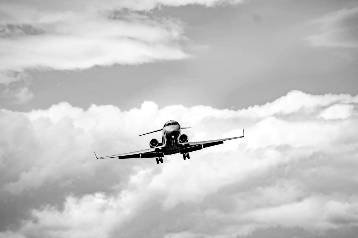 An ultra long range private jet on a quiet apron