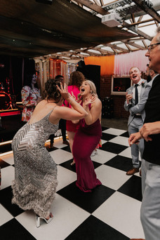 bride dancing with bridesmaid