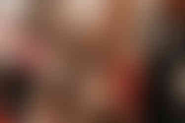 group of women posing in photobooth area