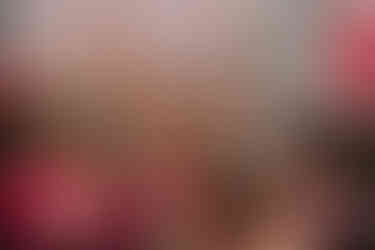 bridesmaid singing with her arms in the air