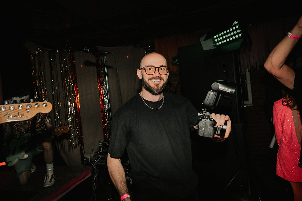 photographer smiling at the camera