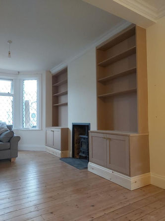 Bespoke Twin Alcove Units with Shelving and Double Cabinets in Reigate, Surrey by New Heights Carpentry.