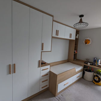 Custom-built bed, wardrobe, and desk for a children's bedroom in Whyteleafe, Surrey.