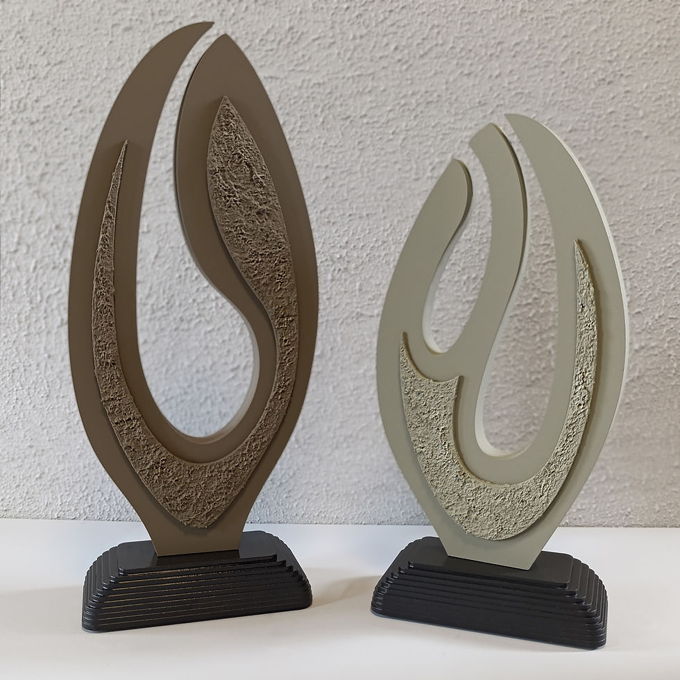 Set of two modern abstract wooden sculptures with smooth and textured surfaces
