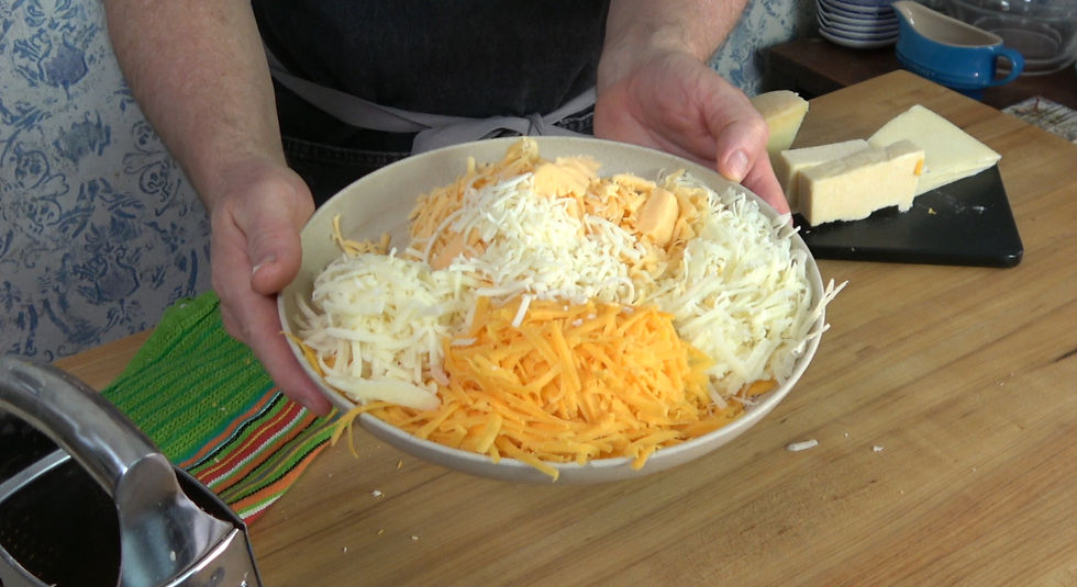 A plate brimming with freshly grated cheese varieties, ready to be used in a delicious Chick-fil-A mac and cheese recipe.