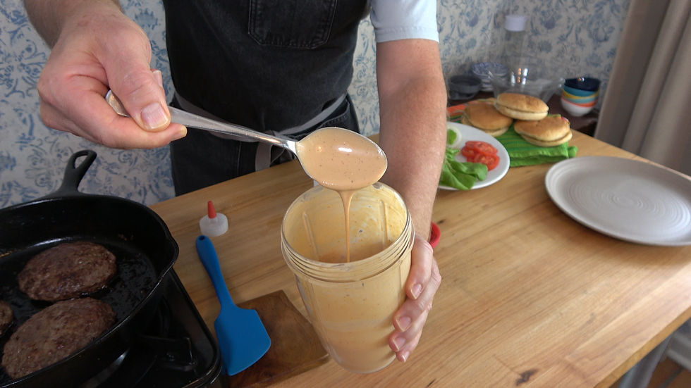 Creating a zesty chipotle burger sauce at home, perfect for dressing up your burgers with a flavorful kick.