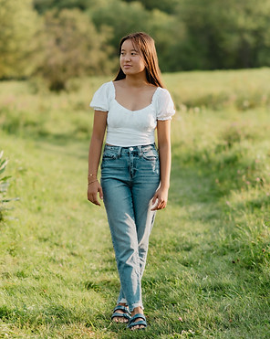 Colchester High School senior poses for her senior portraits taken by Sierra Gorkun Photography
