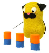 Knitted pink bird looks down