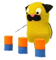 Knitted yellow dog counts skittles
