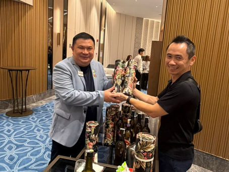 Myzduri cocktail liqueur gift tubes presented at a Malaysian business event