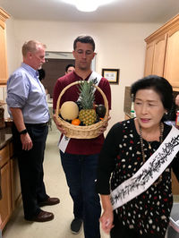 Buddhist giving offerings to altar