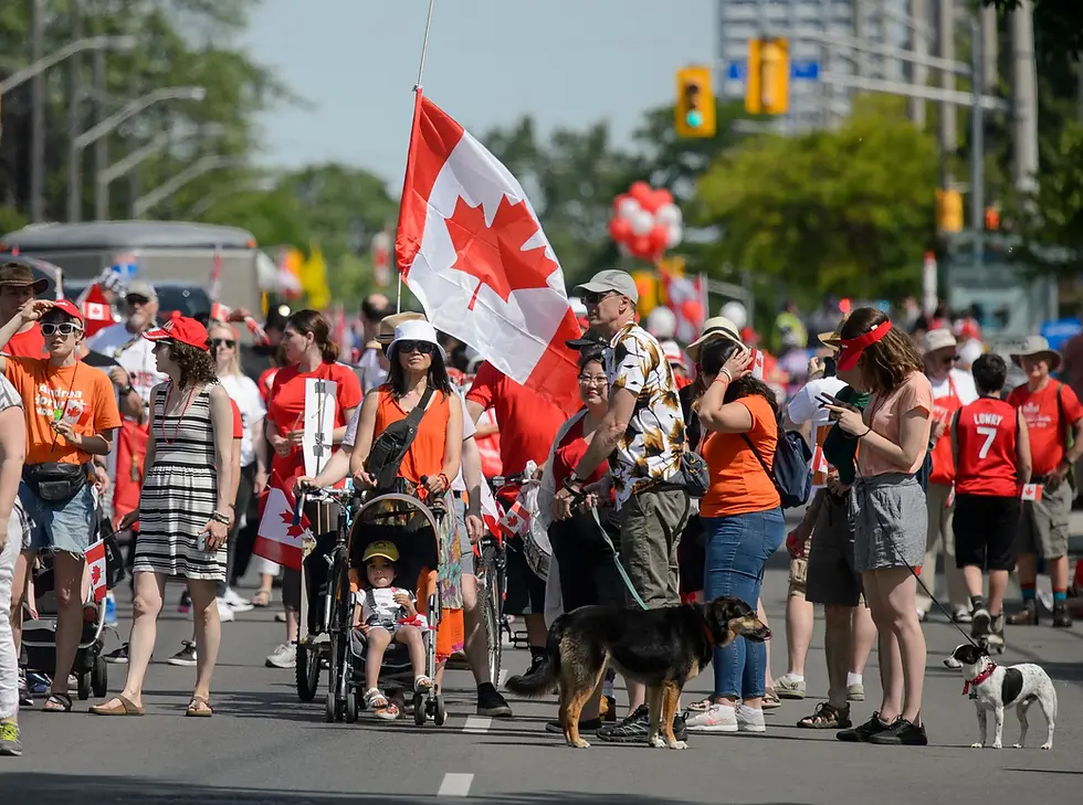 Canadians gathered at a public civic event representing Canadian democracy, civil society, national identity, and community engagement in public life