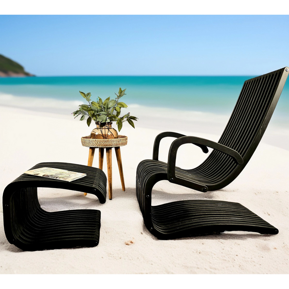 black modern outdoor chair parametric desigh with foolstool located on the seashore