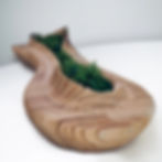 Parametric wood bench with organic serpentine shape and built-in greenery — Verdant Serpentine.