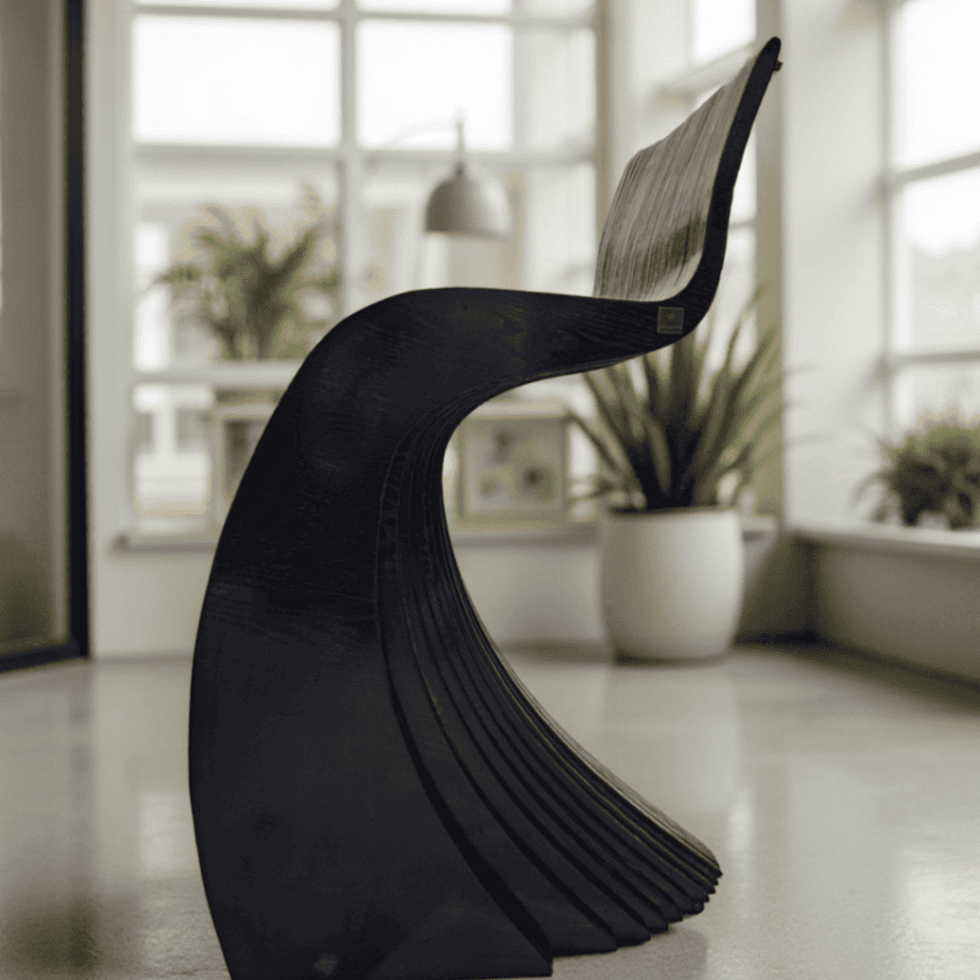 Two modern bar stools made in USA with sculptural wooden curves in a contemporary kitchen.