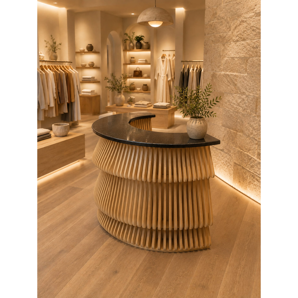 Modern desk in a warm, contemporary boutique interior.