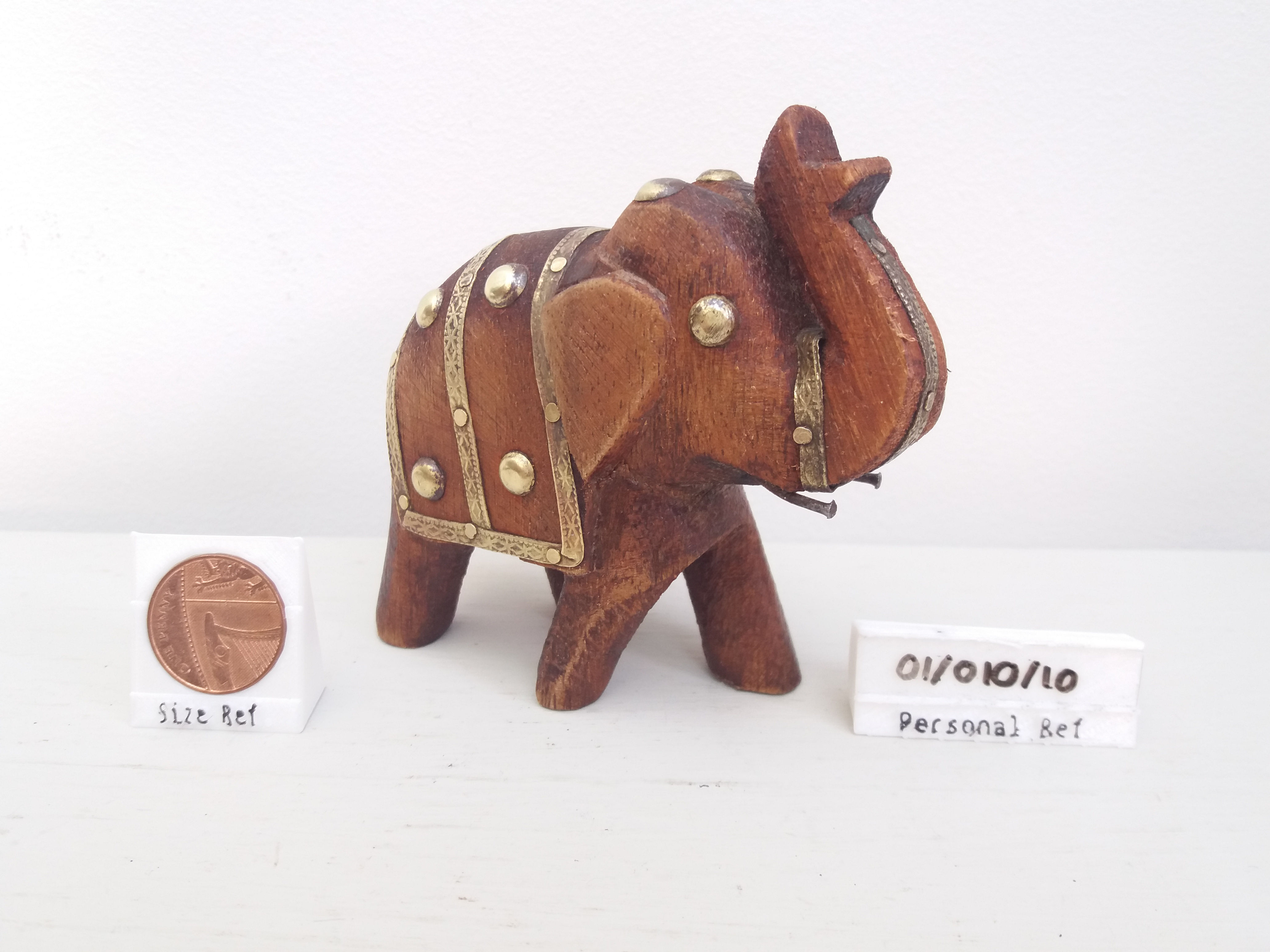 Handmade wooden and brass elephant