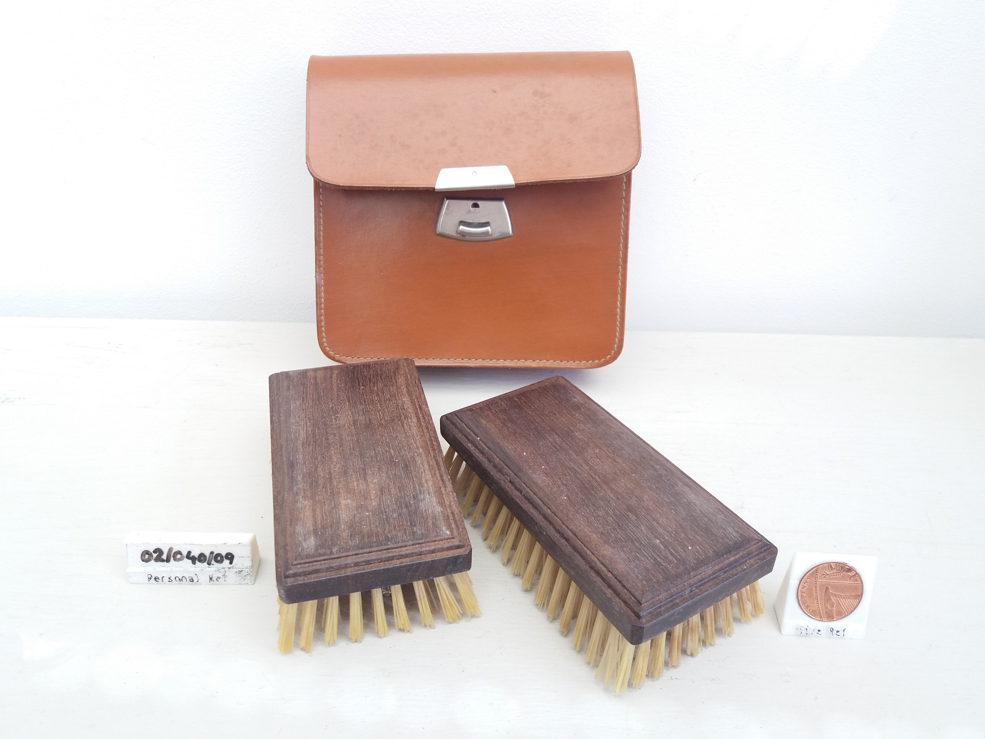 Pair of Wooden-Handled Brushes in Leather Case