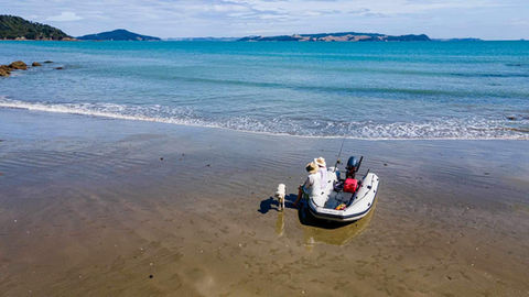 Durable Takacat Inflatable Boat on beach