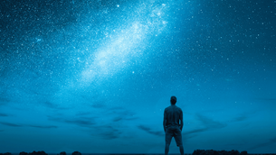 Leader looking at North Star sky – symbol of purpose-driven leadership