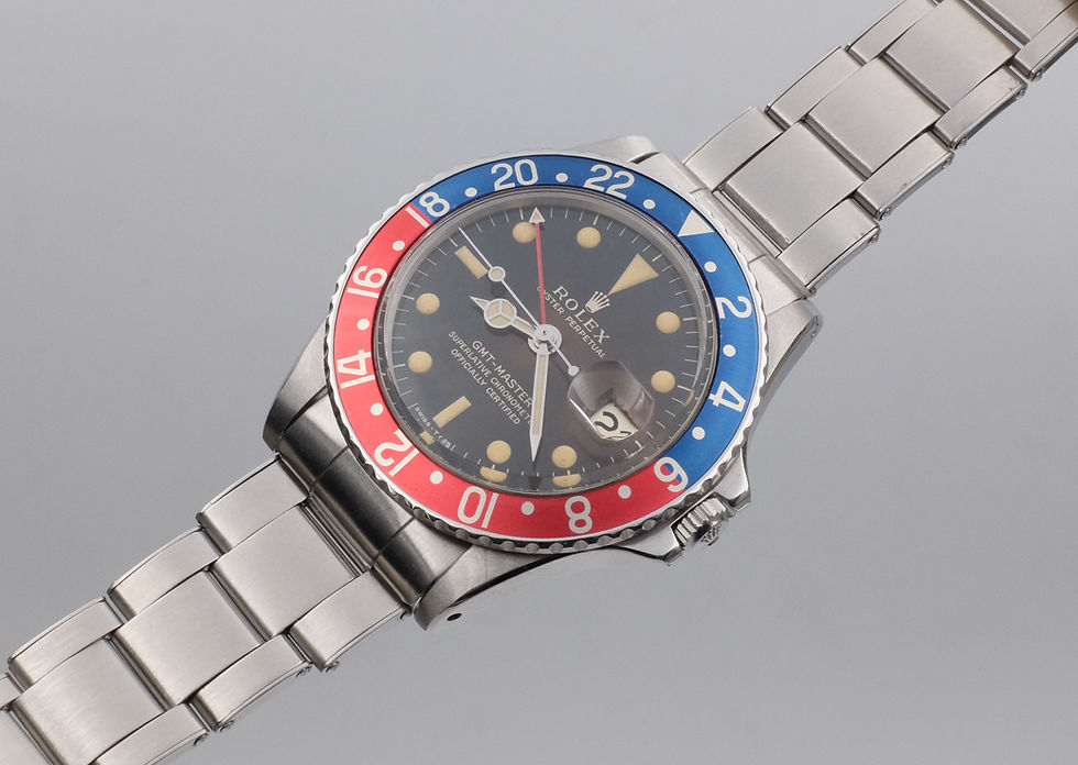 Thumbnail: 1966 Rolex GMT Master Ref. 1675 'Glossy Gilt Tropical dial'
