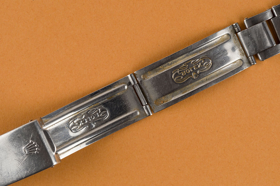 Thumbnail: 1965 Rolex Submariner Ref. 5513 'Double T < 25 Underline' Tropical Gilt dial