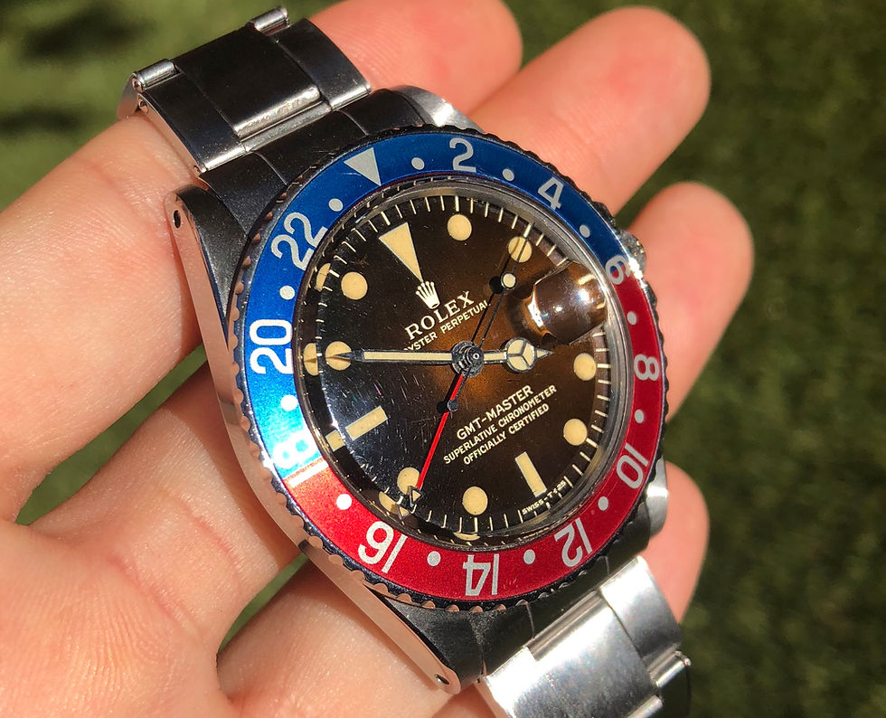 Thumbnail: 1966 Rolex GMT Master Ref. 1675 'Glossy Gilt Tropical dial'