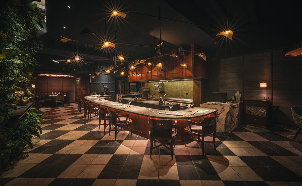 Dark and moody, elegant restaurant interior design