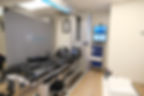 Medical treatment room with Accu-SPINA spinal decompression table.