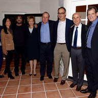 A group of person smiling for a picture.