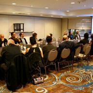 A meeting and discussion of group of people.