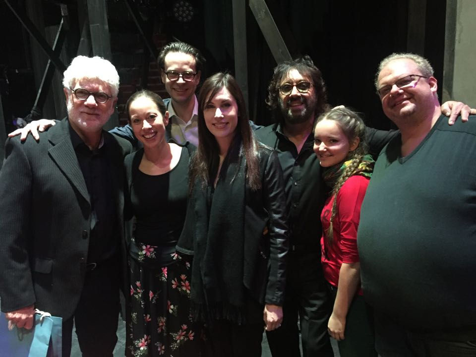 Shuki Levy and Tori Avey Levy with other people smiling for a picture.