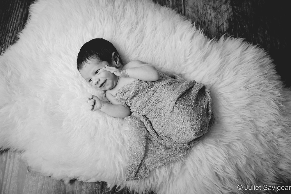 Baby On Sheepskin Rug